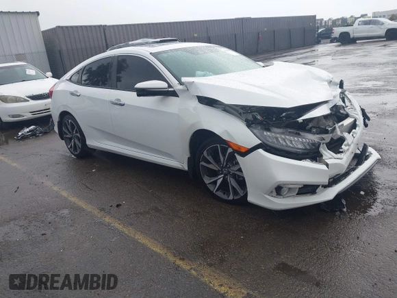 2020 Honda Civic Sedan Touring with VIN 19XFC1F91LE210390, listed as a IAAI auction lot 41766652 with 67,269 mi miles. Bid and sale history available at carsss.com. Image 1.