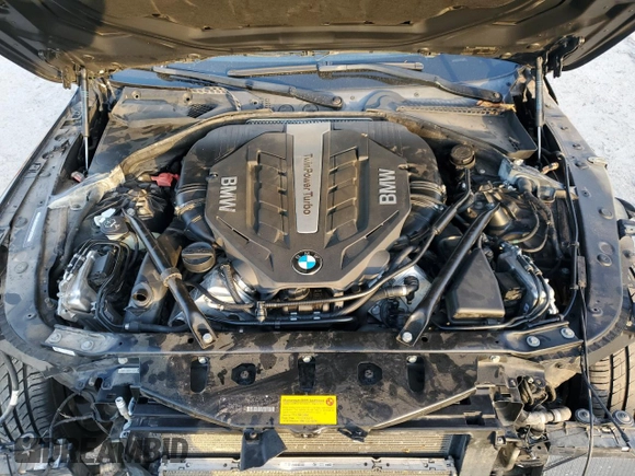 2014 BMW 6 Series 650i z VIN WBA6B2C53ED129256, wystawiony jako Copart lot #85346084 z przebiegiem 51 948 mil mil oraz Szkoda całkowita • Salvage title. Historia ofert i sprzedaży dostępna na DreamBid. Obrazek 11.