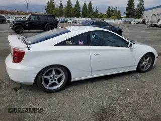 2004 Toyota Celica GT with VIN JTDDR32TX40174017, listed as a Copart auction lot 73748694 with 138,701 mi miles and Salvage Title. Bid and sale history available at DreamBid. Image 3.