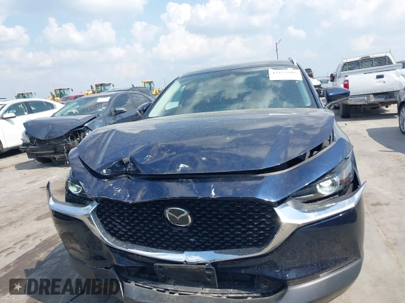 2023 Mazda CX-30 S Carbon Edition with VIN 3MVDMBCM4PM542160, listed as a IAAI auction lot 42175395 with 11,340 mi miles and . Bid and sale history available at DreamBid. Image 12.