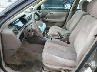 1999 Toyota Camry LE z VIN 4T1BG22K8XU522288, wystawiony jako Copart lot #56928325 z przebiegiem 150 818 mil mil oraz Szkoda całkowita • Salvage title. Historia ofert i sprzedaży dostępna na DreamBid. Obrazek 7.