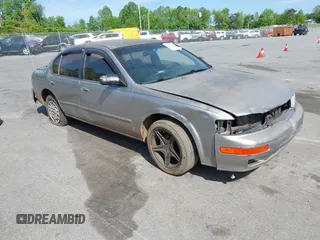 1999 Nissan Maxima GXE z VIN JN1CA21D1XT202977, wystawiony jako IAAI lot #42076425 z przebiegiem Nie podano mil oraz . Historia ofert i sprzedaży dostępna na DreamBid. Obrazek 1.