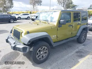 2007 Jeep Wrangler Unlimited X with VIN 1J8GB39107L114510, listed as a IAAI auction lot 41736367 with 467,567 mi miles and . Bid and sale history available at DreamBid. Image 2.