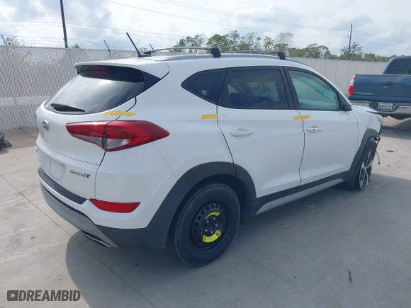 2017 Hyundai Tucson Value with VIN KM8J33A27HU564306, listed as a IAAI auction lot 40983257 with 53,590 mi miles. Bid and sale history available at carsss.com. Image 4.