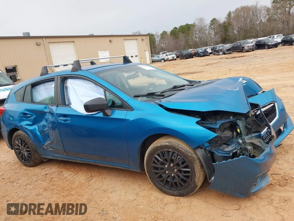 2019 Subaru Impreza with VIN 4S3GTAA64K3718084, listed as a IAAI auction lot 41726910 with 56,523 mi miles and . Bid and sale history available at DreamBid. Image 13.