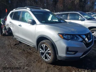 2018 Nissan Rogue S with VIN 5N1AT2MV0JC815212, listed as a IAAI auction lot 41537700 with 100,115 mi miles. Bid and sale history available at carsss.com. Image 1.