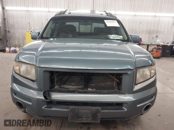 2006 Honda Ridgeline RTL with VIN 2HJYK16556H508101, listed as a IAAI auction lot 41909651 with 301,945 mi miles. Bid and sale history available at carsss.com. Image 6.