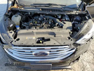 2020 Ford Edge SE z VIN 2FMPK3G91LBA42481, wystawiony jako Copart lot #50135885 z przebiegiem 104 656 mil mil oraz Nie do naprawy • Non repairable. Historia ofert i sprzedaży dostępna na DreamBid. Obrazek 14.