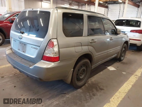 2007 Subaru Forester X w/Premium Pkg with VIN JF1SG65657H719525, listed as a IAAI auction lot 41696437 with 217,895 mi miles. Bid and sale history available at carsss.com. Image 4.