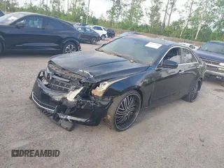 2014 Cadillac ATS Standard RWD z VIN 1G6AA5RA8E0167775, wystawiony jako IAAI lot #41972796 z przebiegiem 145 443 mil mil oraz . Historia ofert i sprzedaży dostępna na DreamBid. Obrazek 2.