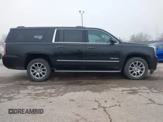2017 GMC Yukon XL Denali with VIN 1GKS2HKJ2HR310377, listed as a IAAI auction lot 41153582 with 130,194 mi miles. Bid and sale history available at carsss.com. Image 14.