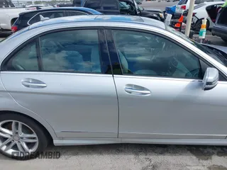 2014 Mercedes-Benz C 250 Sport with VIN WDDGF4HB1EA951907, listed as a IAAI auction lot 42580563 with 51,592 mi miles and . Bid and sale history available at DreamBid. Image 14.