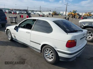 1996 BMW 3-Series 318TI with VIN WBACG8324TAU36317, listed as a IAAI auction lot 41489402 with 139,956 mi miles. Bid and sale history available at carsss.com. Image 3.