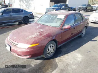 2002 Saturn LS z VIN 1G8JU54F72Y519923, wystawiony jako IAAI lot #40676524 z przebiegiem Nie podano mil oraz . Historia ofert i sprzedaży dostępna na DreamBid. Obrazek 2.