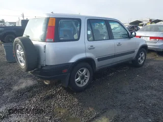 1998 Honda CR-V EX with VIN JHLRD1865WC105122, listed as a IAAI auction lot 41402405 with 148,469 mi miles. Bid and sale history available at carsss.com. Image 4.