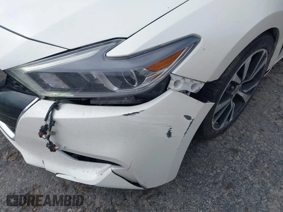 2016 Nissan Maxima SR with VIN 1N4AA6AP4GC449440, listed as a IAAI auction lot 41756271 with 136,685 mi miles and . Bid and sale history available at DreamBid. Image 6.