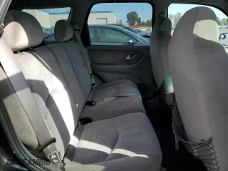 2001 Mazda Tribute LX with VIN 4F2YU09151KM38909, listed as a Copart auction lot 77808264 with 136,005 mi miles and Salvage Title. Bid and sale history available at carsss.com. Image 11.