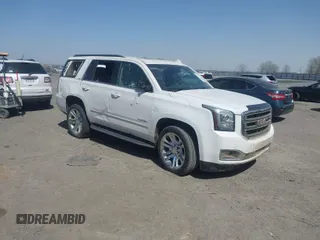 2017 GMC Yukon SLT with VIN 1GKS1BKC9HR278190, listed as a IAAI auction lot 41824213 with 104,323 mi miles. Bid and sale history available at carsss.com. Image 1.