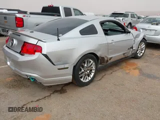 2011 Ford Mustang V6 with VIN 1ZVBP8AMXB5142041, listed as a IAAI auction lot 41938438 with 126,591 mi miles and . Bid and sale history available at carsss.com. Image 4.