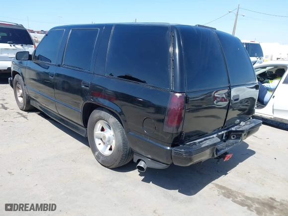 2000 Chevrolet Tahoe Limited with VIN 1GNEC13R7YR195106, listed as a IAAI auction lot 41948564 with 190,250 mi miles. Bid and sale history available at carsss.com. Image 3.
