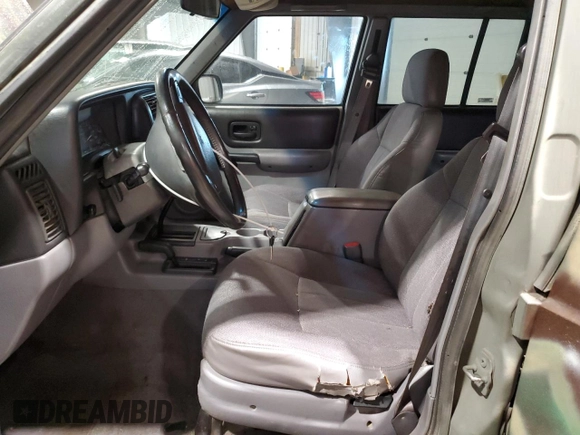 1998 Jeep Cherokee Sport with VIN 1J4FJ68S7WL269467, listed as a Copart auction lot 58664135 with 187,741 mi miles and Clean title. Bid and sale history available at DreamBid. Image 7.