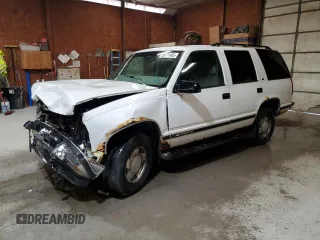 1999 Chevrolet Tahoe Z71 z VIN 1GNEK13R9XJ328285, wystawiony jako Copart lot #58771465 z przebiegiem 206 982 mil mil oraz Szkoda całkowita • Salvage title. Historia ofert i sprzedaży dostępna na DreamBid. Obrazek 1.