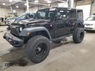 2016 Jeep Wrangler Unlimited Rubicon Hard Rock z VIN 1C4BJWFG0GL148249, wystawiony jako Copart lot #60313155 z przebiegiem 96 678 mil mil oraz Szkoda całkowita • Salvage title. Historia ofert i sprzedaży dostępna na DreamBid. Obrazek 1.