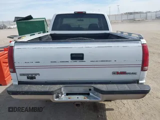 1995 GMC Sierra 1500 z VIN 2GTEK19K0S1580688, wystawiony jako IAAI lot #41811015 z przebiegiem 143 260 mil mil oraz . Historia ofert i sprzedaży dostępna na DreamBid. Obrazek 16.