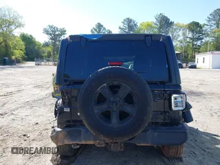 2019 Jeep Wrangler Unlimited Sport S with VIN 1C4HJXDG7KW671598, listed as a IAAI auction lot 42059734 with 63,899 mi miles and . Bid and sale history available at DreamBid. Image 16.