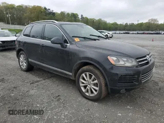 2014 Volkswagen Touareg Lux with VIN WVGEF9BP5ED005175, listed as a Copart auction lot 51815565 with 163,183 mi miles and Clean Title. Bid and sale history available at DreamBid. Image 4.