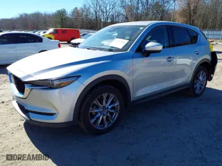 2020 Mazda CX-5 Grand Touring with VIN JM3KFADM7L0731479, listed as a IAAI auction lot 41697226 with 90,517 mi miles. Bid and sale history available at carsss.com. Image 2.