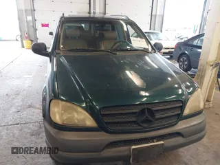 1998 Mercedes-Benz M-Class with VIN 4JGAB54E1WA011086, listed as a IAAI auction lot 41534717 with 186,273 mi miles. Bid and sale history available at carsss.com. Image 12.