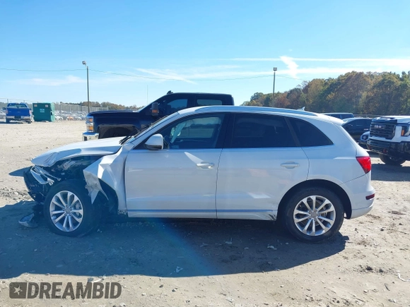 2014 Audi Q5 Premium z VIN WA1CFAFP0EA061818, wystawiony jako IAAI lot #40845361 z przebiegiem 166 333 mil mil oraz . Historia ofert i sprzedaży dostępna na DreamBid. Obrazek 14.