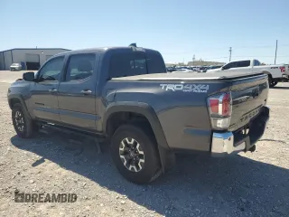 2023 Toyota Tacoma SR with VIN 3TYCZ5AN9PT131515, listed as a Copart auction lot 57900865 with Not provided miles and Salvage title. Bid and sale history available at DreamBid. Image 2.