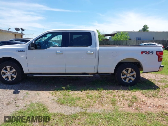 2018 Ford F-150 XL with VIN 1FTFW1E5XJKE02519, listed as a IAAI auction lot 42180274 with 184,101 mi miles. Bid and sale history available at carsss.com. Image 14.