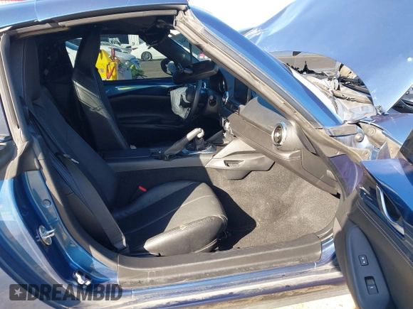 2020 Mazda MX-5 Miata Grand Touring z VIN JM1NDAM75L0412507, wystawiony jako IAAI lot #41573544 z przebiegiem Nie podano mil oraz . Historia ofert i sprzedaży dostępna na DreamBid. Obrazek 5.