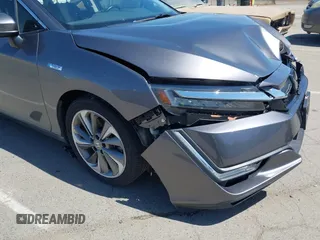 2018 Honda Clarity Touring z VIN JHMZC5F33JC021811, wystawiony jako IAAI lot #42272808 z przebiegiem 82 414 mil mil oraz . Historia ofert i sprzedaży dostępna na DreamBid. Obrazek 18.