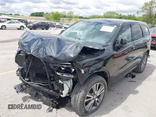 2013 Dodge Durango SXT with VIN 1C4RDJAG4DC697450, listed as a IAAI auction lot 42336657 with 177,476 mi miles and . Bid and sale history available at DreamBid. Image 17.