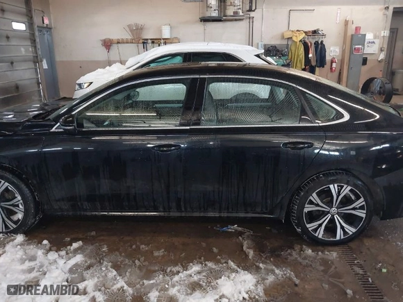 2022 Volkswagen Passat 2.0T SE with VIN 1VWSA7A31NC003418, listed as a IAAI auction lot 41608219 with 76,591 mi miles. Bid and sale history available at carsss.com. Image 14.