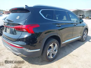 2021 Hyundai Santa Fe SEL z VIN 5NMS64AJ3MH331523, wystawiony jako IAAI lot #42201780 z przebiegiem 84 319 mil mil oraz . Historia ofert i sprzedaży dostępna na DreamBid. Obrazek 4.