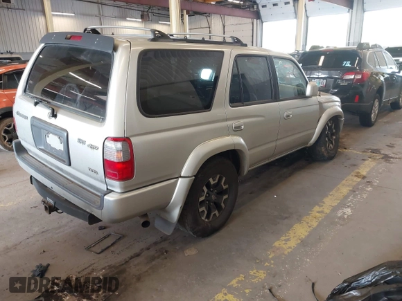 2000 Toyota 4Runner SR5 z VIN JT3HN86R6Y0294870, wystawiony jako IAAI lot #42131835 z przebiegiem 292 259 mil mil oraz . Historia ofert i sprzedaży dostępna na DreamBid. Obrazek 4.