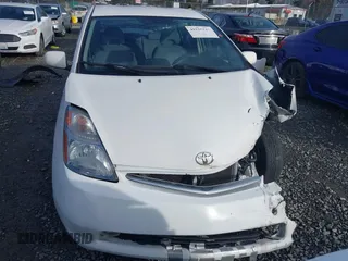 2006 Toyota Prius with VIN JTDKB20U367543084, listed as a IAAI auction lot 41515515 with 142,513 mi miles. Bid and sale history available at carsss.com. Image 12.