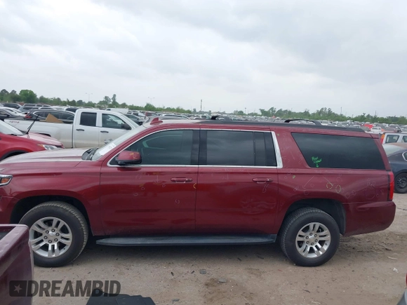 2020 Chevrolet Suburban LT z VIN 1GNSCHKC9LR233596, wystawiony jako IAAI lot #41943325 z przebiegiem 97 515 mil mil oraz . Historia ofert i sprzedaży dostępna na DreamBid. Obrazek 14.
