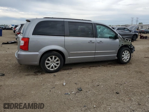 2014 Chrysler Town & Country Touring with VIN 2C4RC1BG1ER225720, listed as a Copart auction lot 58071165 with 104,502 mi miles and Salvage title. Bid and sale history available at DreamBid. Image 3.