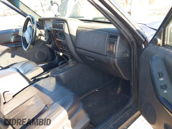 2001 Jeep Cherokee Sport with VIN 1J4FF58S01L527395, listed as a IAAI auction lot 41829601 with 265,465 mi miles and . Bid and sale history available at DreamBid. Image 5.
