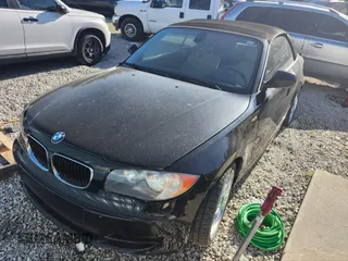 2010 BMW 1 Series 128i with VIN WBAUL7C52AVJ77448, listed as a IAAI auction lot 41886372 with 97,567 mi miles and . Bid and sale history available at DreamBid. Image 6.