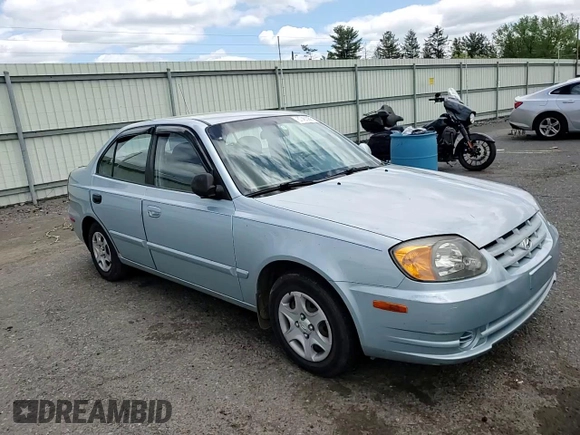 2004 Hyundai Accent GL z VIN KMHCG45C94U574027, wystawiony jako Copart lot #57463905 z przebiegiem 139 595 mil mil oraz Szkoda całkowita • Salvage title. Historia ofert i sprzedaży dostępna na DreamBid. Obrazek 14.