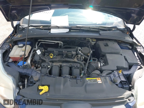 2012 Ford Focus SE z VIN 1FAHP3F22CL157417, wystawiony jako IAAI lot #42655527 z przebiegiem 107 472 mil mil oraz . Historia ofert i sprzedaży dostępna na DreamBid. Obrazek 10.