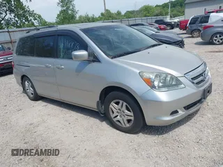 2007 Honda Odyssey EX-L z VIN 5FNRL38797B042602, wystawiony jako IAAI lot #42300656 z przebiegiem 250 000 mil mil oraz . Historia ofert i sprzedaży dostępna na DreamBid. Obrazek 1.