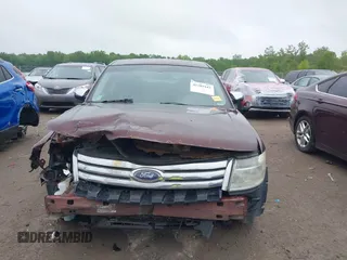 2009 Ford Taurus Limited z VIN 1FAHP25W69G100251, wystawiony jako IAAI lot #42289443 z przebiegiem 187 300 mil mil oraz . Historia ofert i sprzedaży dostępna na DreamBid. Obrazek 12.